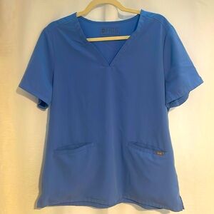 FIGS women’s Ceil Blue Casma three pocket scrub top.
